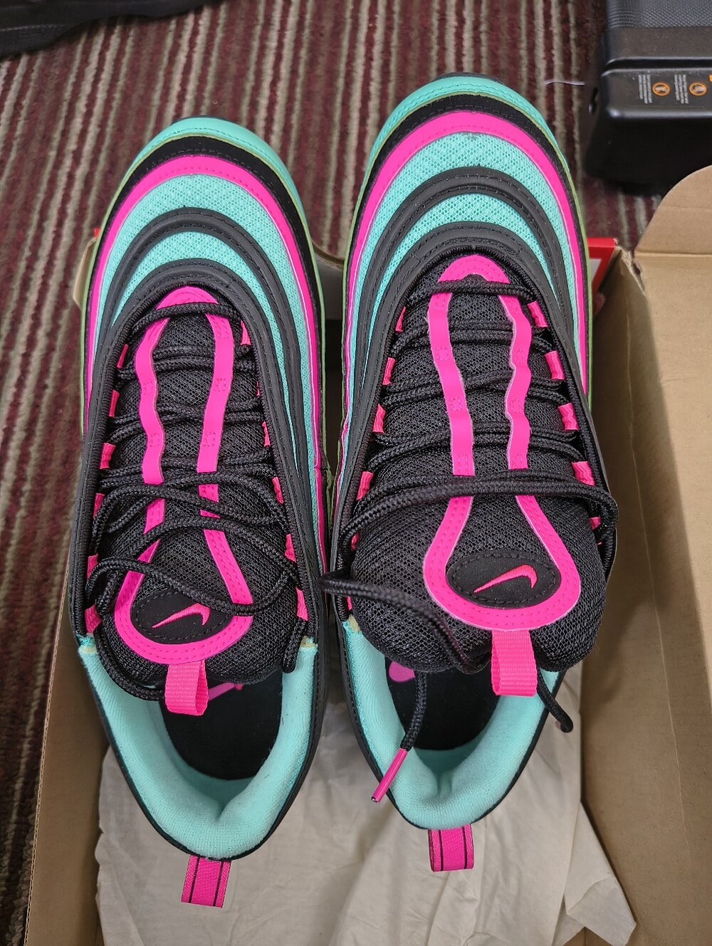 Nike Black Sneakers with Pink Accents